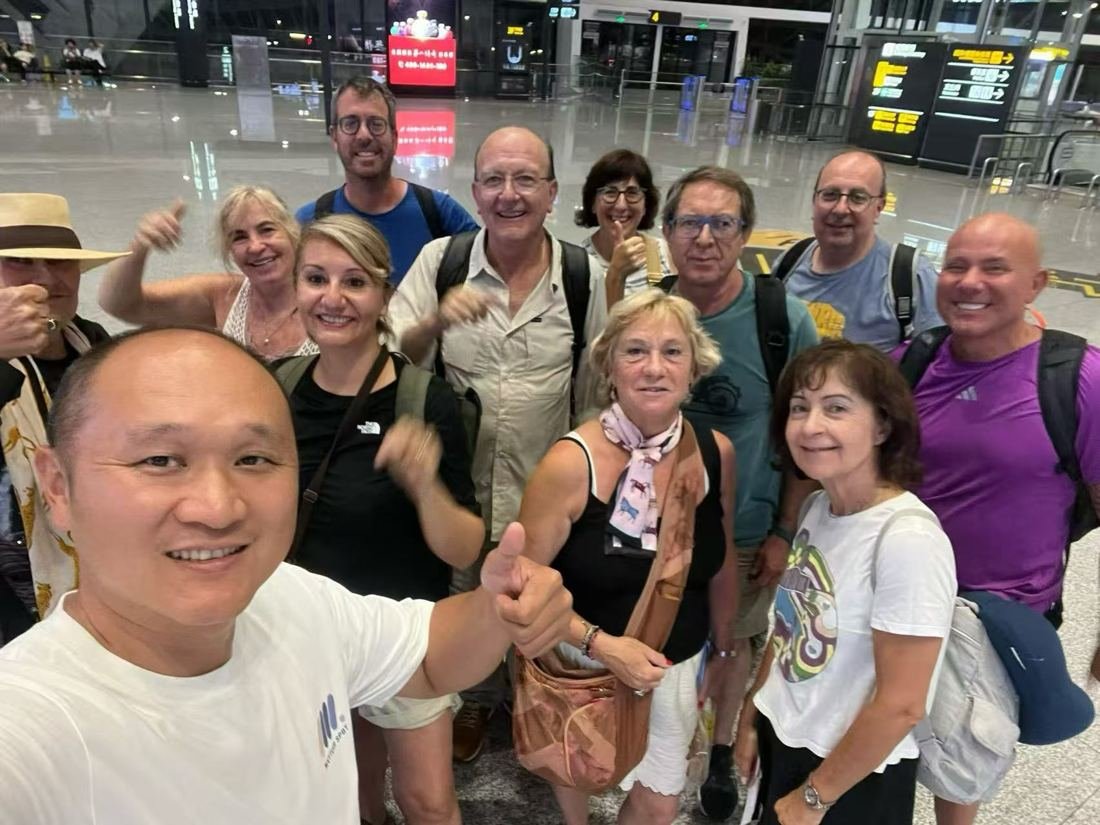 Airport welcome with our guide, Guilin · DE tour group